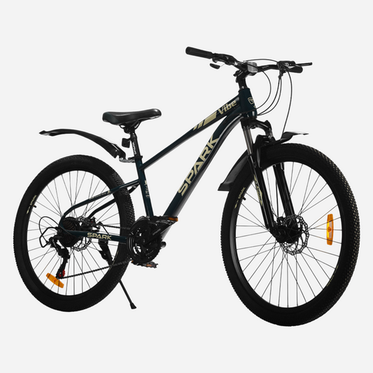 Гірський велосипед Spark VIBE 27.5" сталева рама 15" — вид спереду справа, напис Vibe на рамі та широкі покришки 27.5×2.125