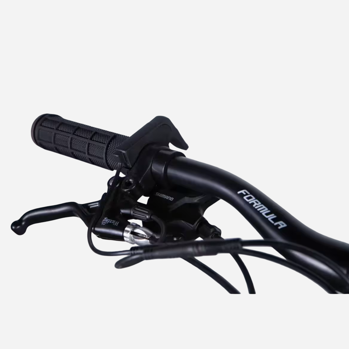 Formula eF-1 DD CS — манетка Shimano SL-M315 та ручка гальма JUNTAI на кермі Formula, крупний план