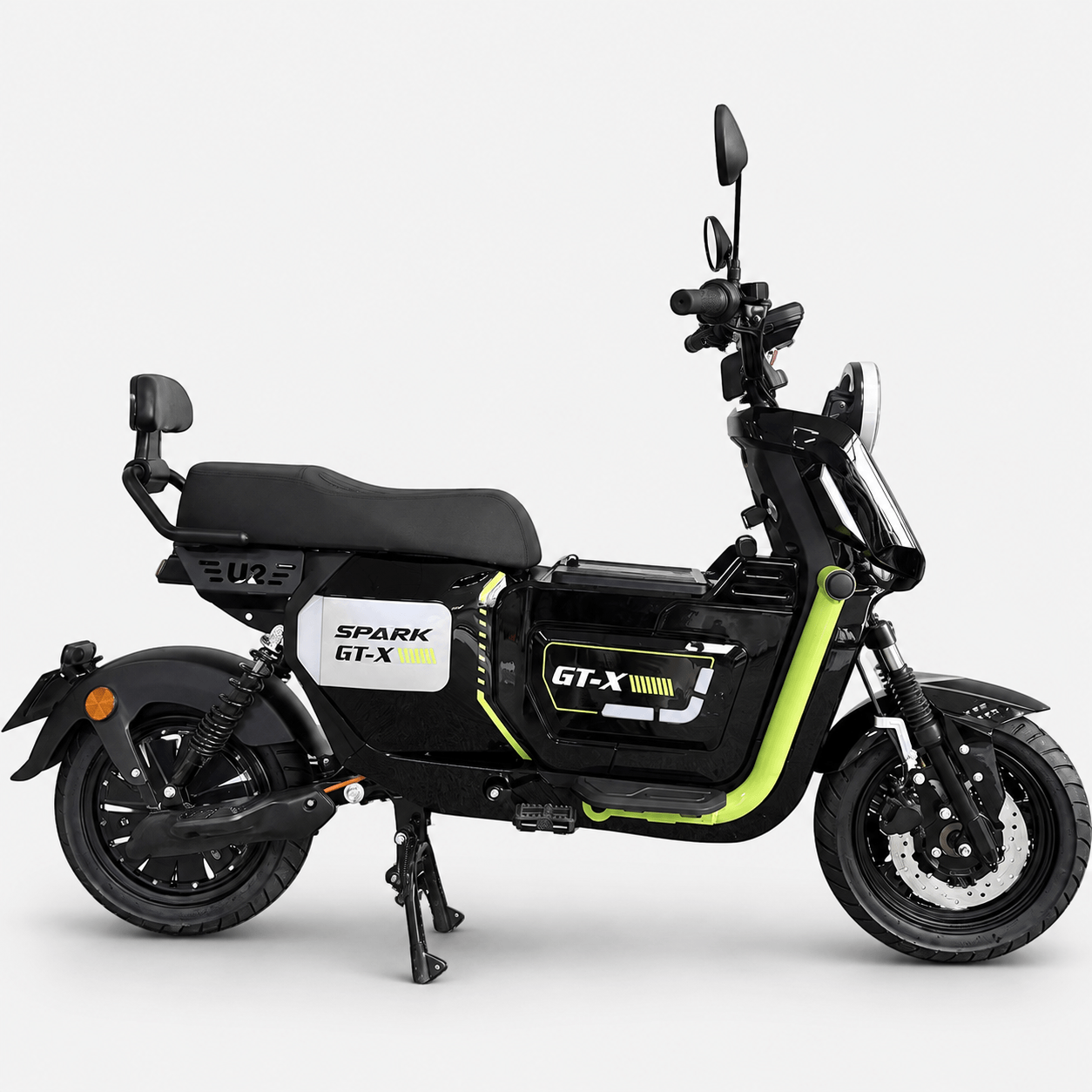 Електровелосипед SPARK GT-X чорного кольору з зеленими вставками, вид збоку, на підніжці