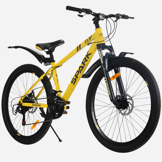 Гірський велосипед Spark FLIP 26" жовтий, правий бік — трансмісія Shimano 21 швидкість, дискове гальмо, пластикові крила, підніжка, широкі покришки 26×2.35