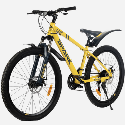Гірський велосипед Spark FLIP 26" жовтий, вид спереду під кутом — амортизаційна вилка Spark з крилом, дискові гальма, руль з манетками Shimano, широкі покришки 26×2.35
