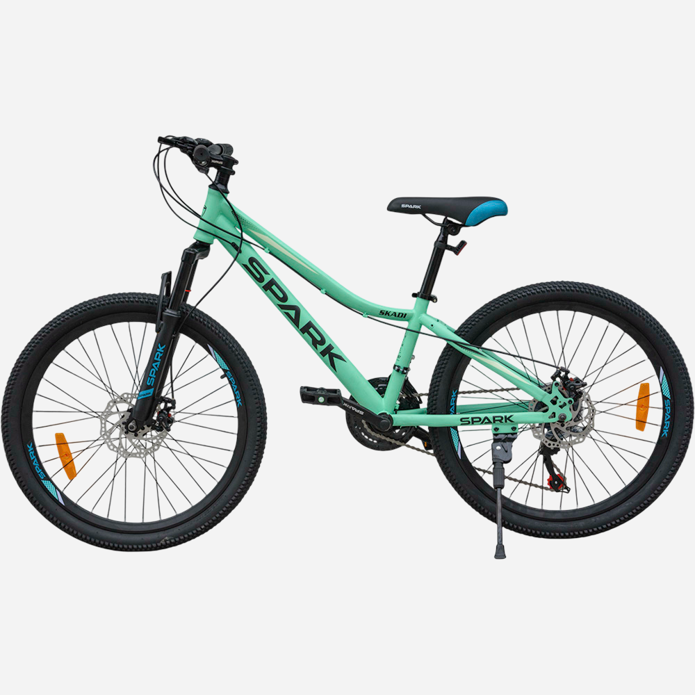 Гірський велосипед Spark SKADI 24" сталева рама 12" м'ятний, вид збоку зліва — дискові гальма, амортизаційна вилка, перемикач Shimano, підніжка
