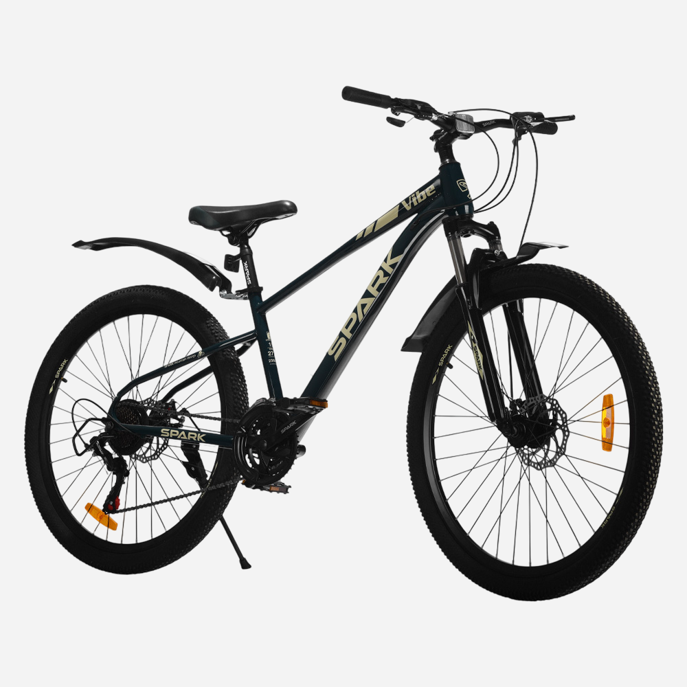 Гірський велосипед Spark VIBE 27.5" сталева рама 15" — вид спереду справа, напис Vibe на рамі та широкі покришки 27.5×2.125