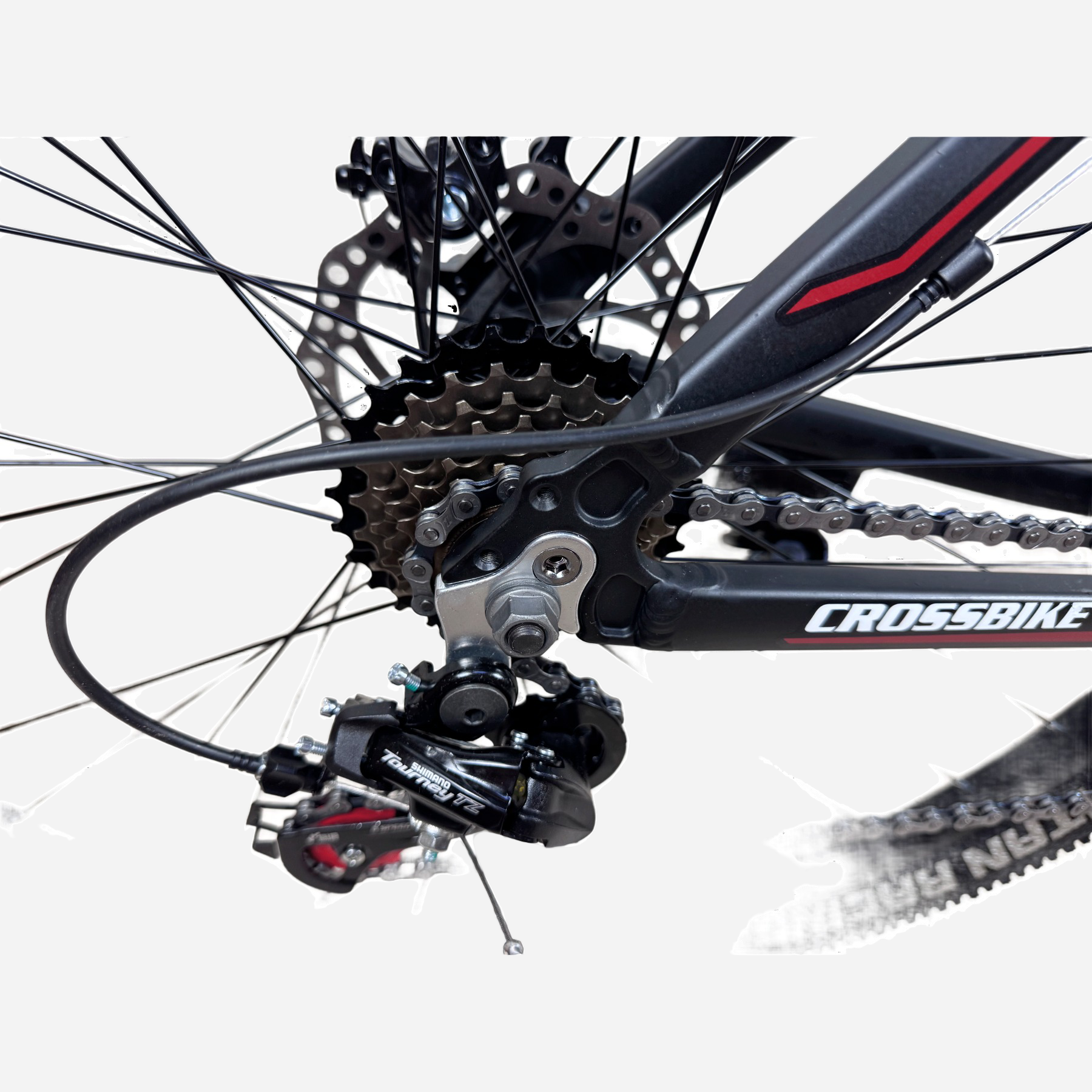 Задній перемикач Shimano Tourney TZ та дисковий гальмо CrossBike Aspect 29"